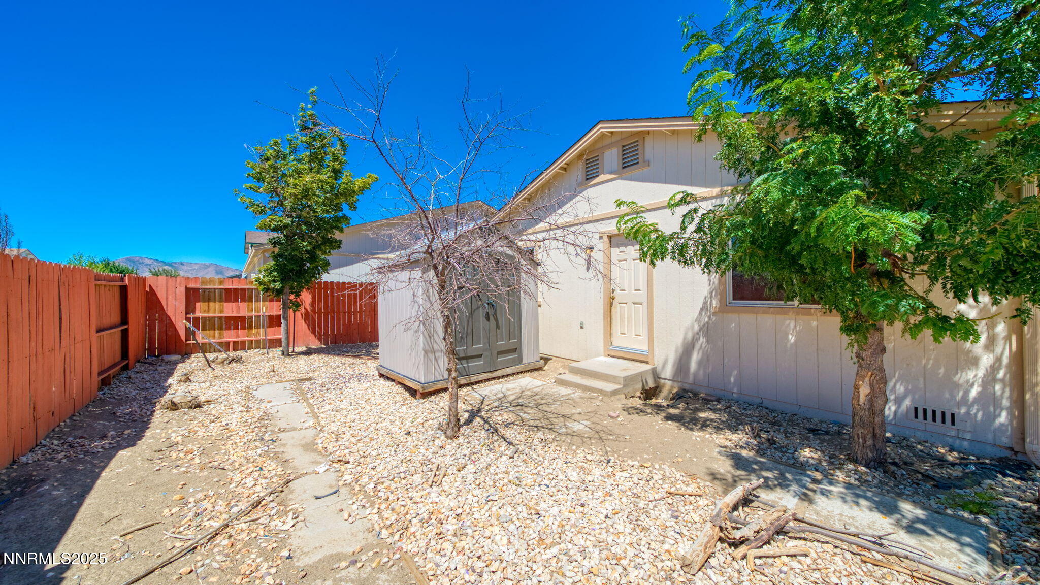17776 Fortune Court Reno, NV 89508 - Photo 27 of 28 a backyard of a house