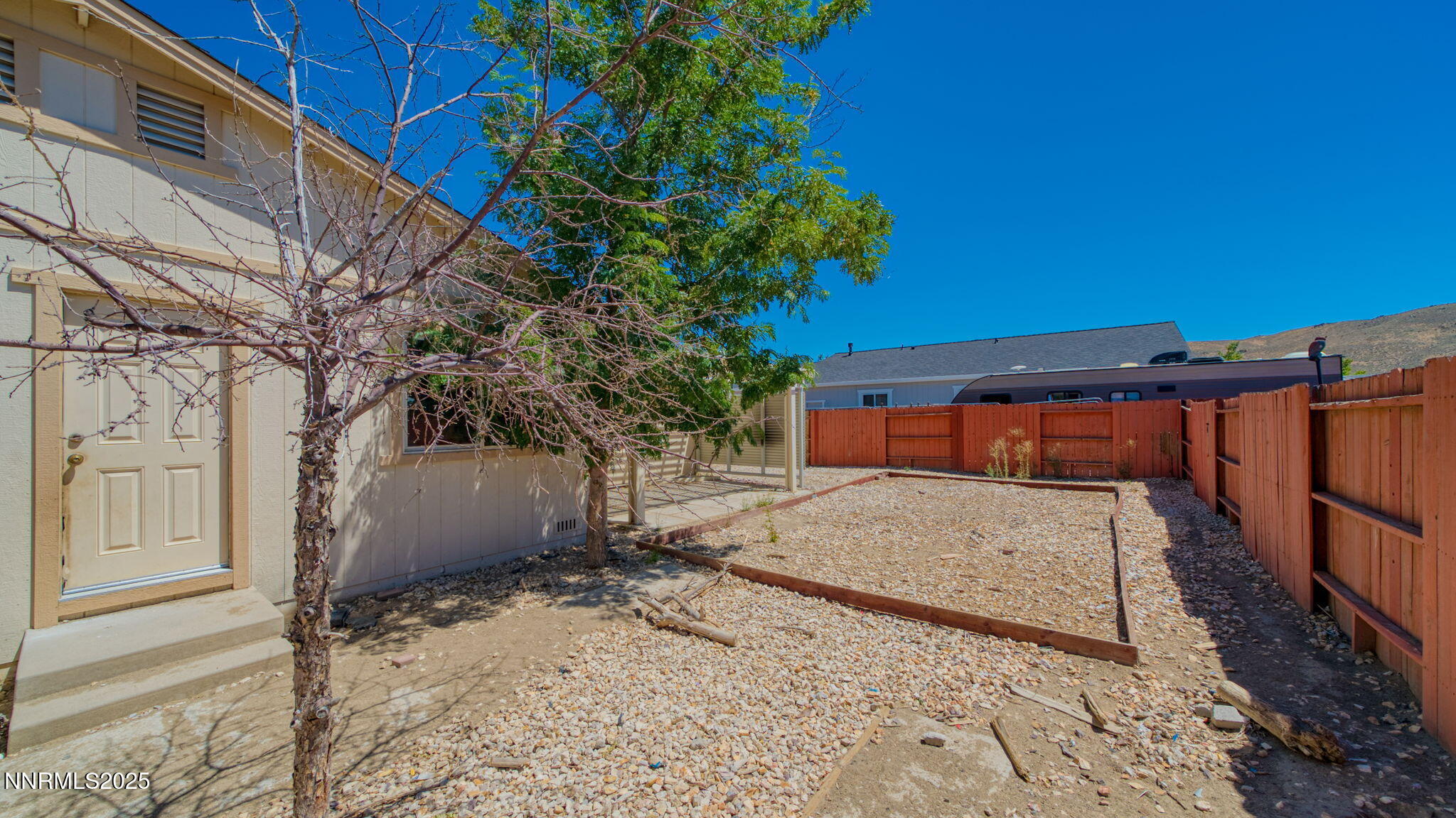 17776 Fortune Court Reno, NV 89508 - Photo 28 of 28 a house with trees in front of it