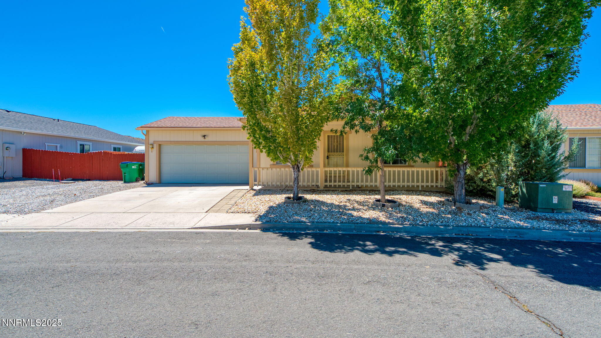 17776 Fortune Court Reno, NV 89508 - Photo 4 of 28 a front view of a house with a yard