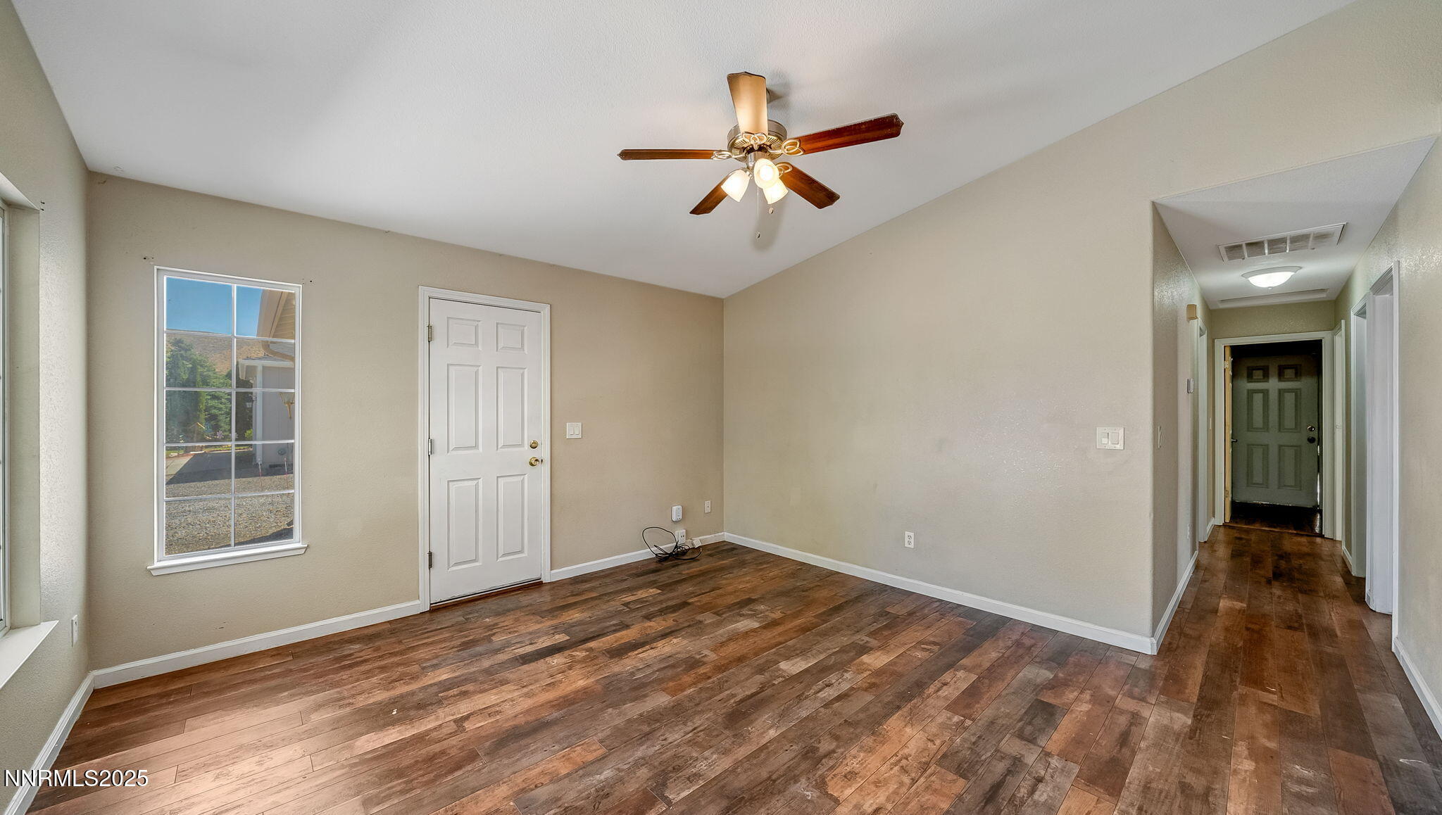 17776 Fortune Court Reno, NV 89508 - Photo 9 of 28 a view of a livingroom with a ceiling fan and window