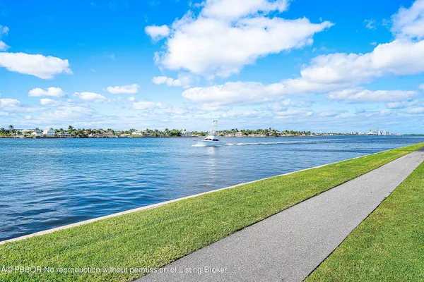 a view of a lake with a big yard