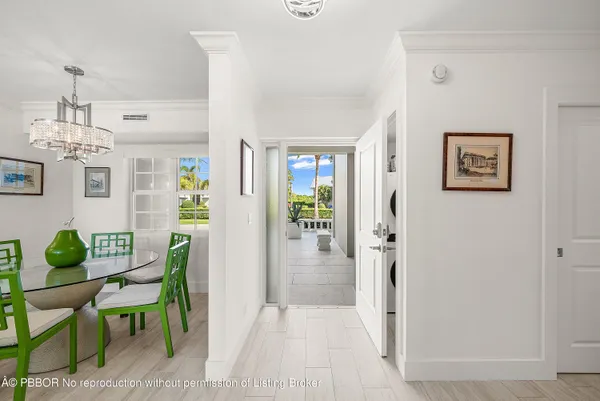 a view of a livingroom with furniture and a window