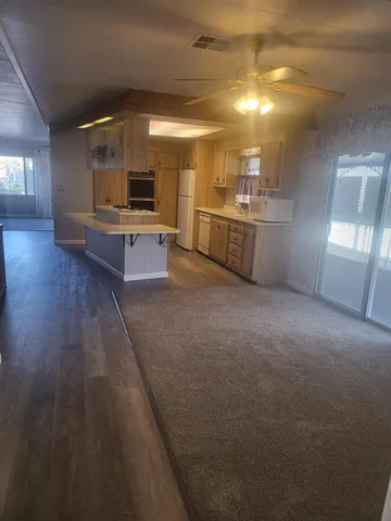 a view of a kitchen with a sink