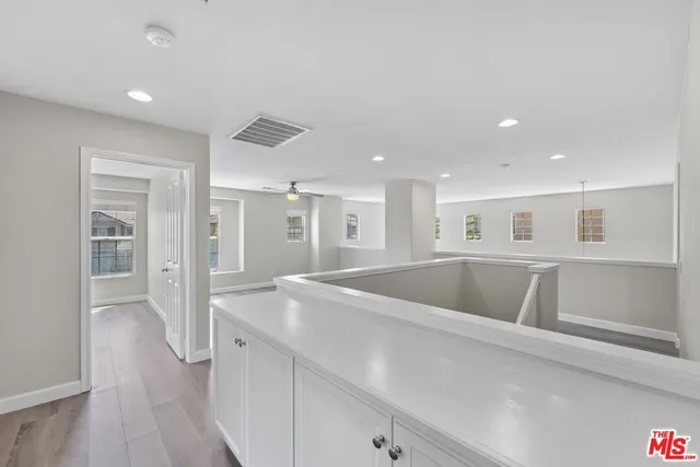 a view of kitchen with wooden floor
