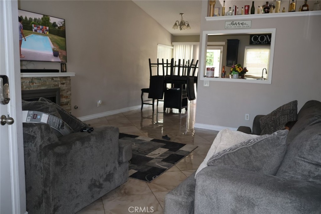 595 Cherry Vista Drive Perris, CA 92571 - Photo 4 of 20 a bed room with a bed furniture and a window