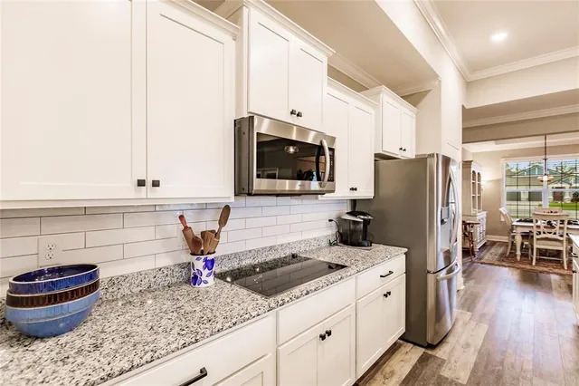 a spacious bathroom with a bathtub and shower