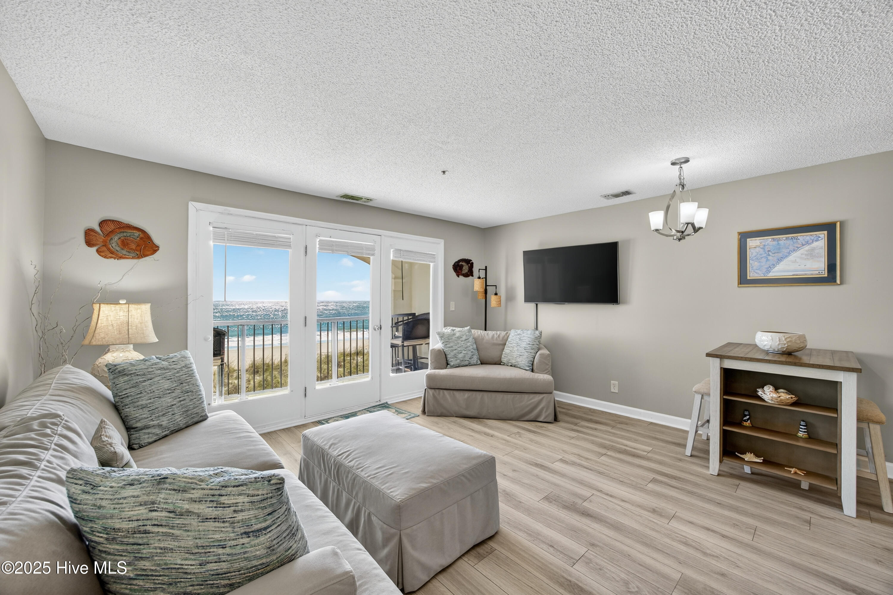 790 New River Inlet Road, Unit 115A North Topsail Beach, NC 28460 - Photo 4 of 40 Living room
