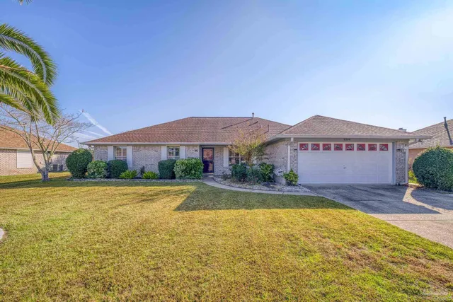 a view of a house with swimming pool