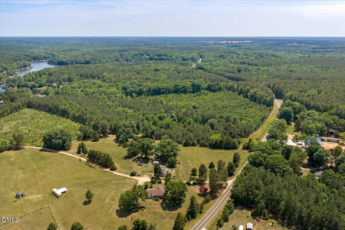 109 Little Ponderosa Road Macon, NC 27551 - Photo 31 of 32 an aerial view of residential houses with outdoor space and trees