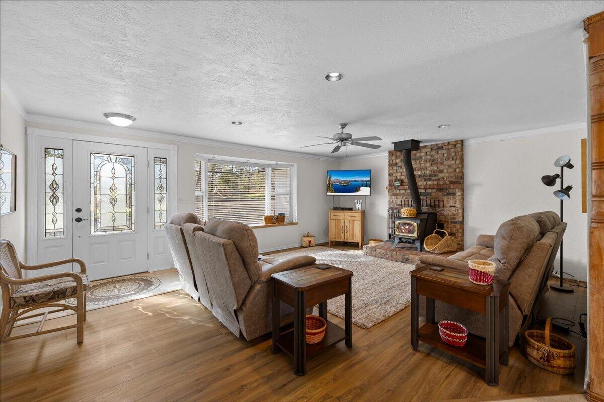 324 China Gulch Road Jacksonville, OR 97530 - Photo 7 of 45 a living room with furniture and a window