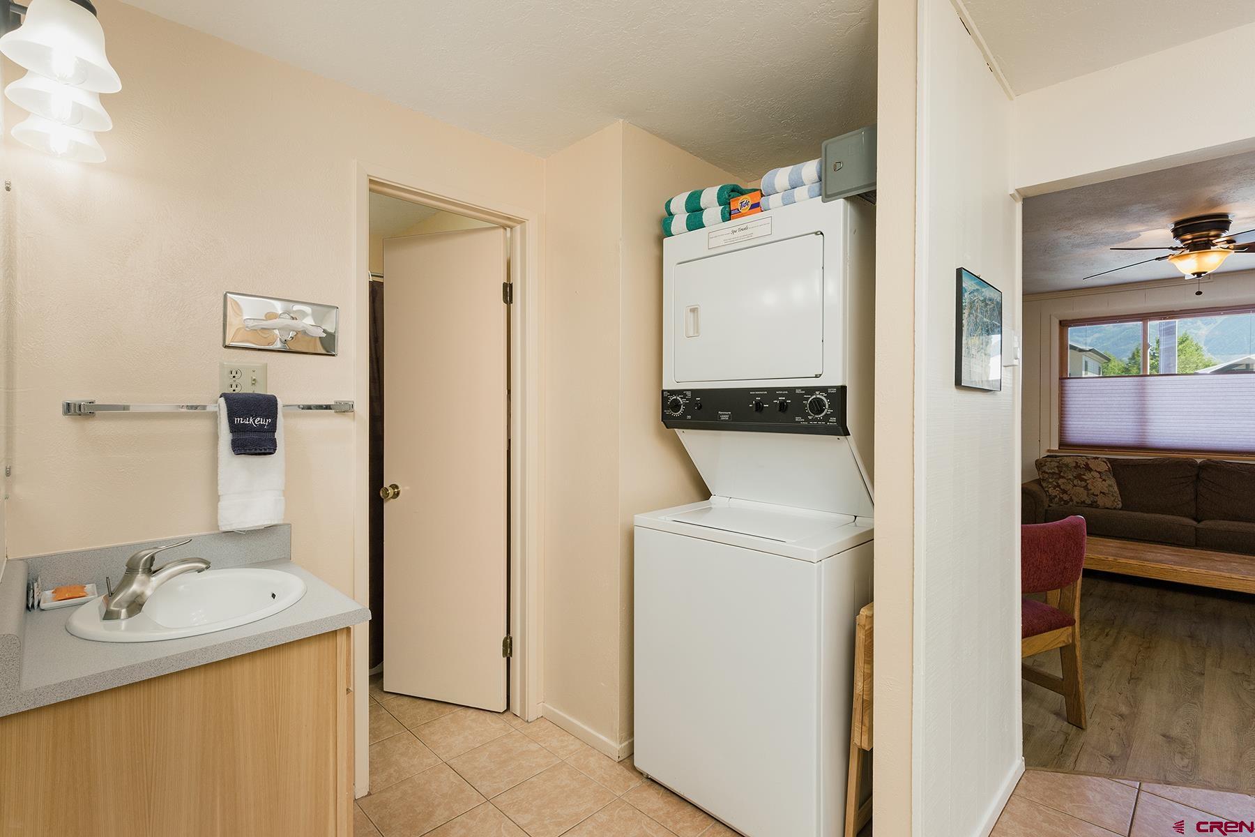 400 Sheol Street, Unit 8 Durango, CO 81301 - Photo 12 of 35 a view of bathroom with a sink washer and dryer