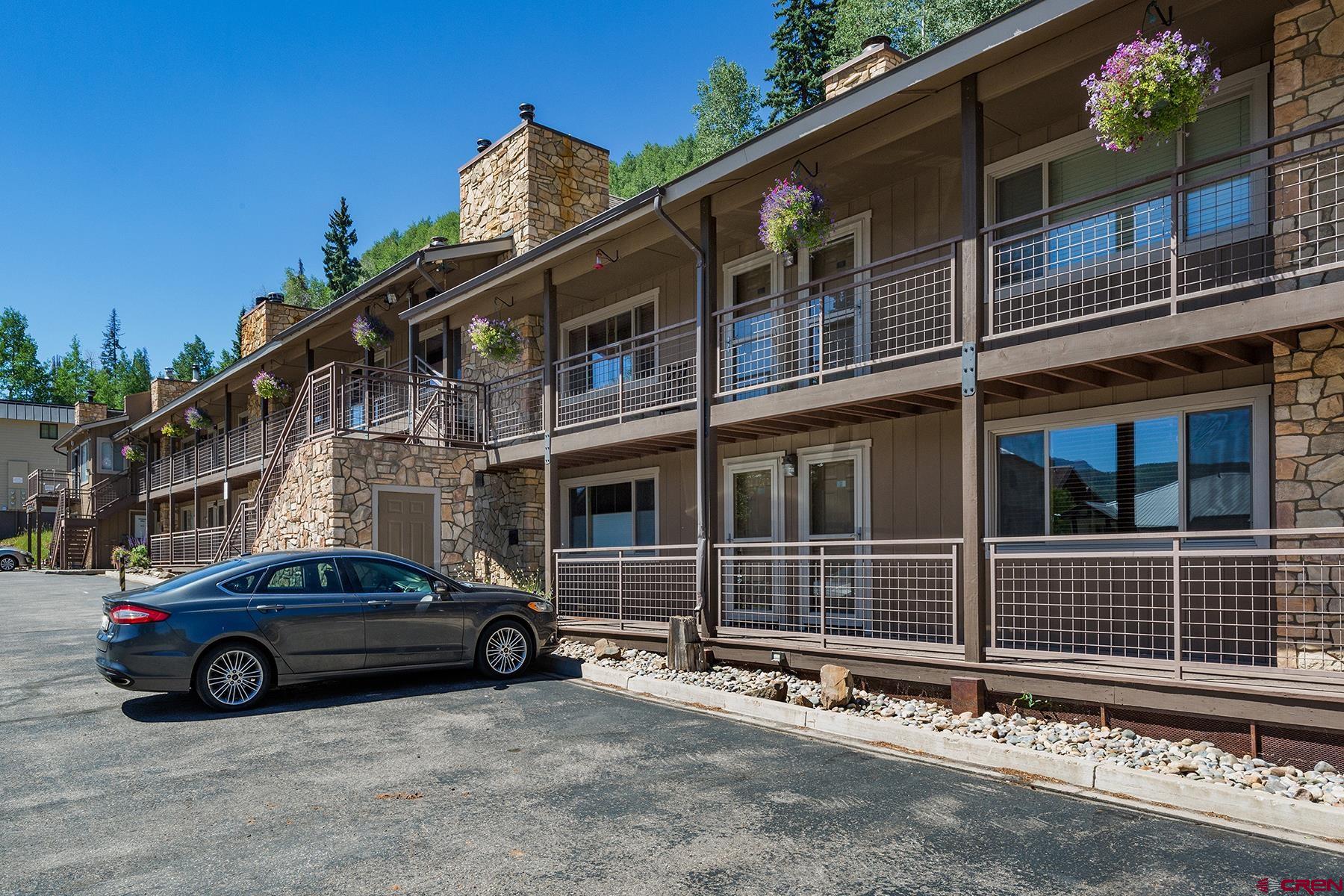 400 Sheol Street, Unit 8 Durango, CO 81301 - Photo 21 of 35 a car parked in front of a house