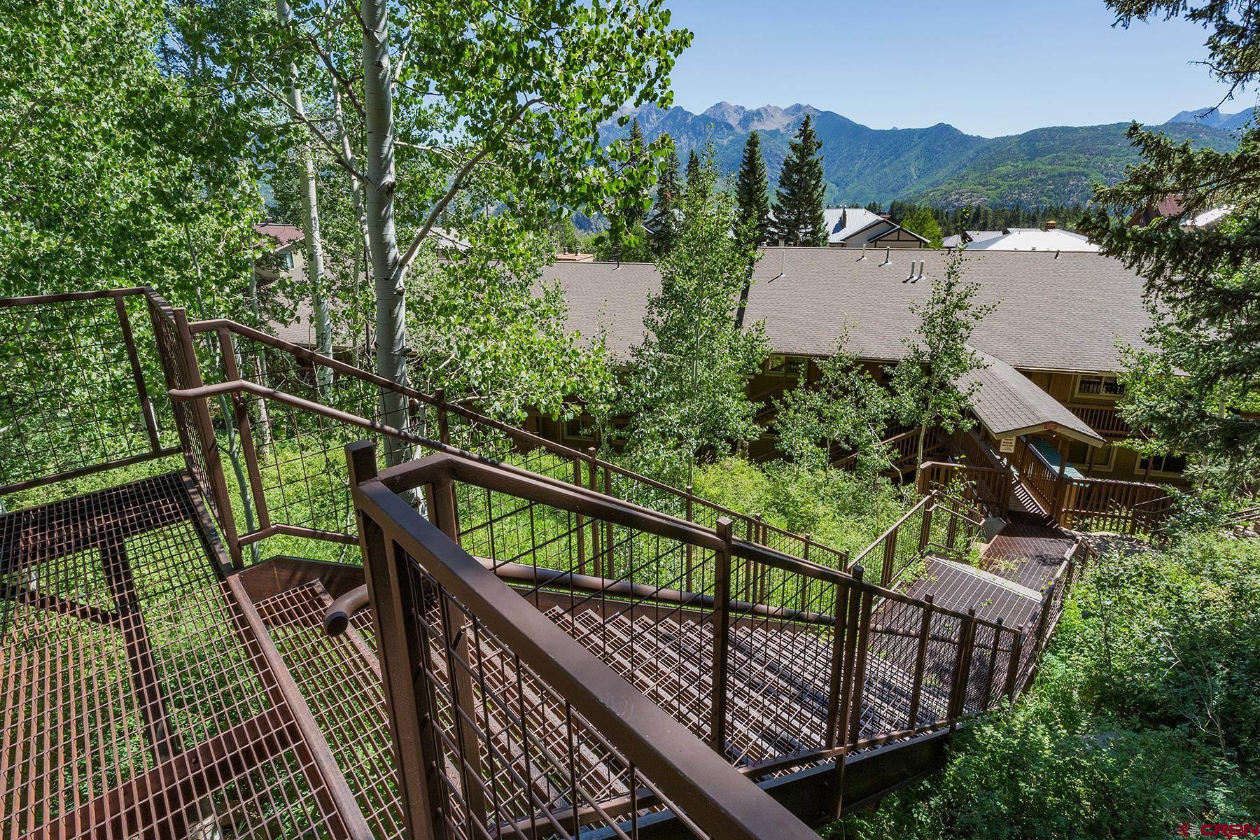 400 Sheol Street, Unit 8 Durango, CO 81301 - Photo 23 of 35 a view of a balcony with wooden floor and fence