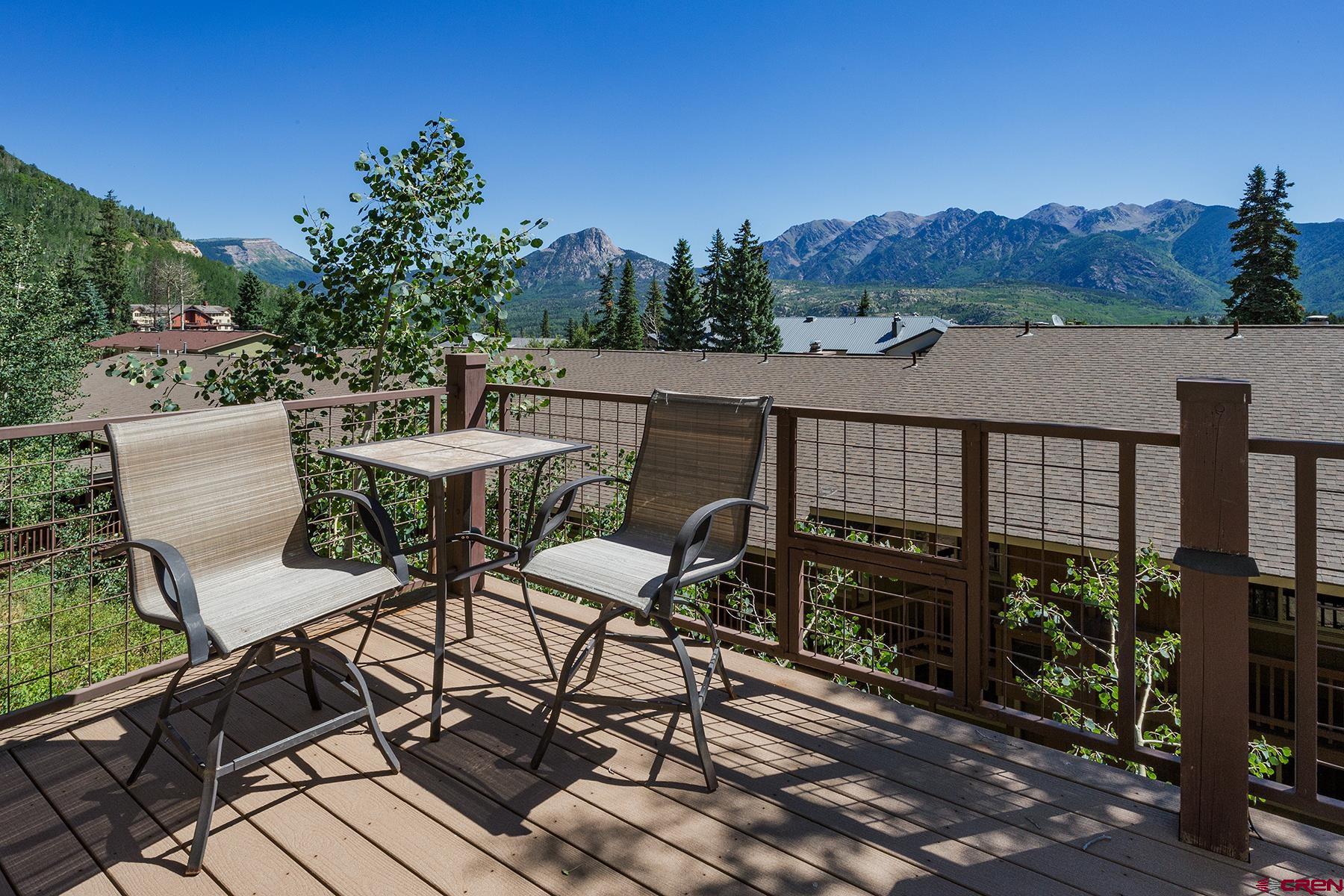 400 Sheol Street, Unit 8 Durango, CO 81301 - Photo 28 of 35 a view of a chairs and table on the terrace