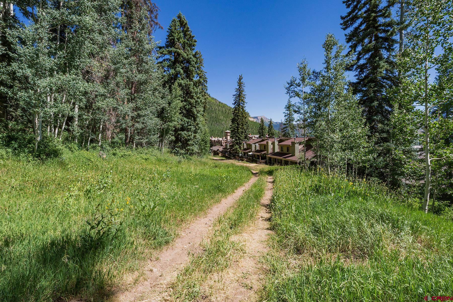400 Sheol Street, Unit 8 Durango, CO 81301 - Photo 34 of 35 a view of a lake with a yard