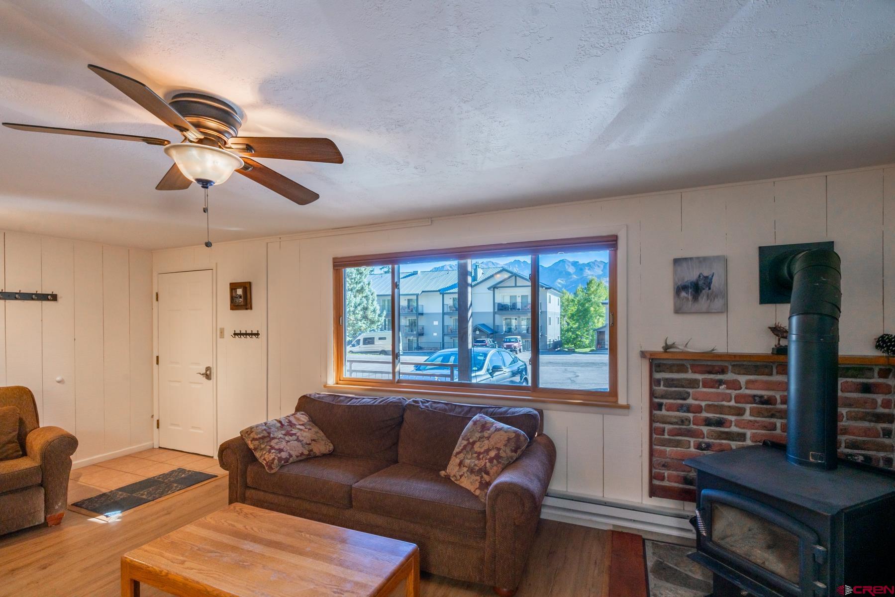 400 Sheol Street, Unit 8 Durango, CO 81301 - Photo 4 of 35 a living room with furniture and a window