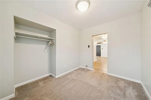 a bathroom with a sink vanity tub and shower