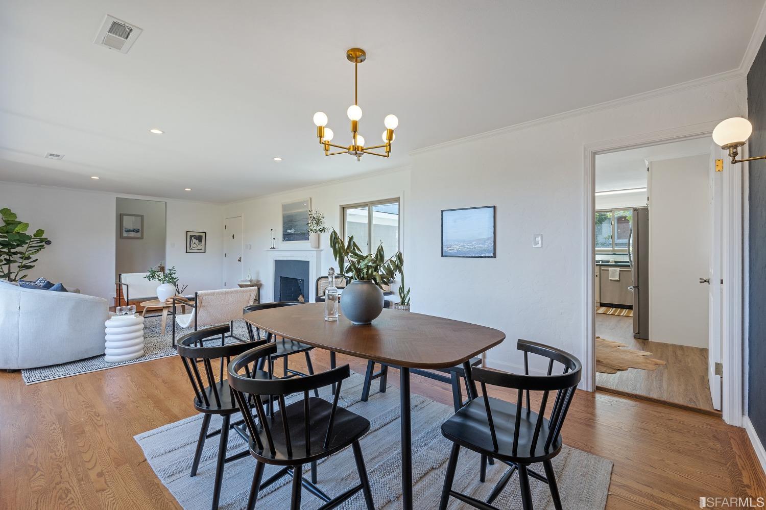1368 Hillcrest Boulevard Millbrae, CA 94030 - Photo 21 of 65 a view of a dining room with furniture and wooden floor