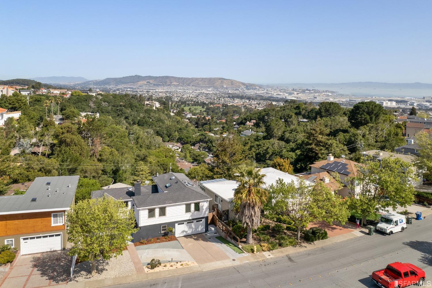 1368 Hillcrest Boulevard Millbrae, CA 94030 - Photo 3 of 65 an aerial view of a house with a yard