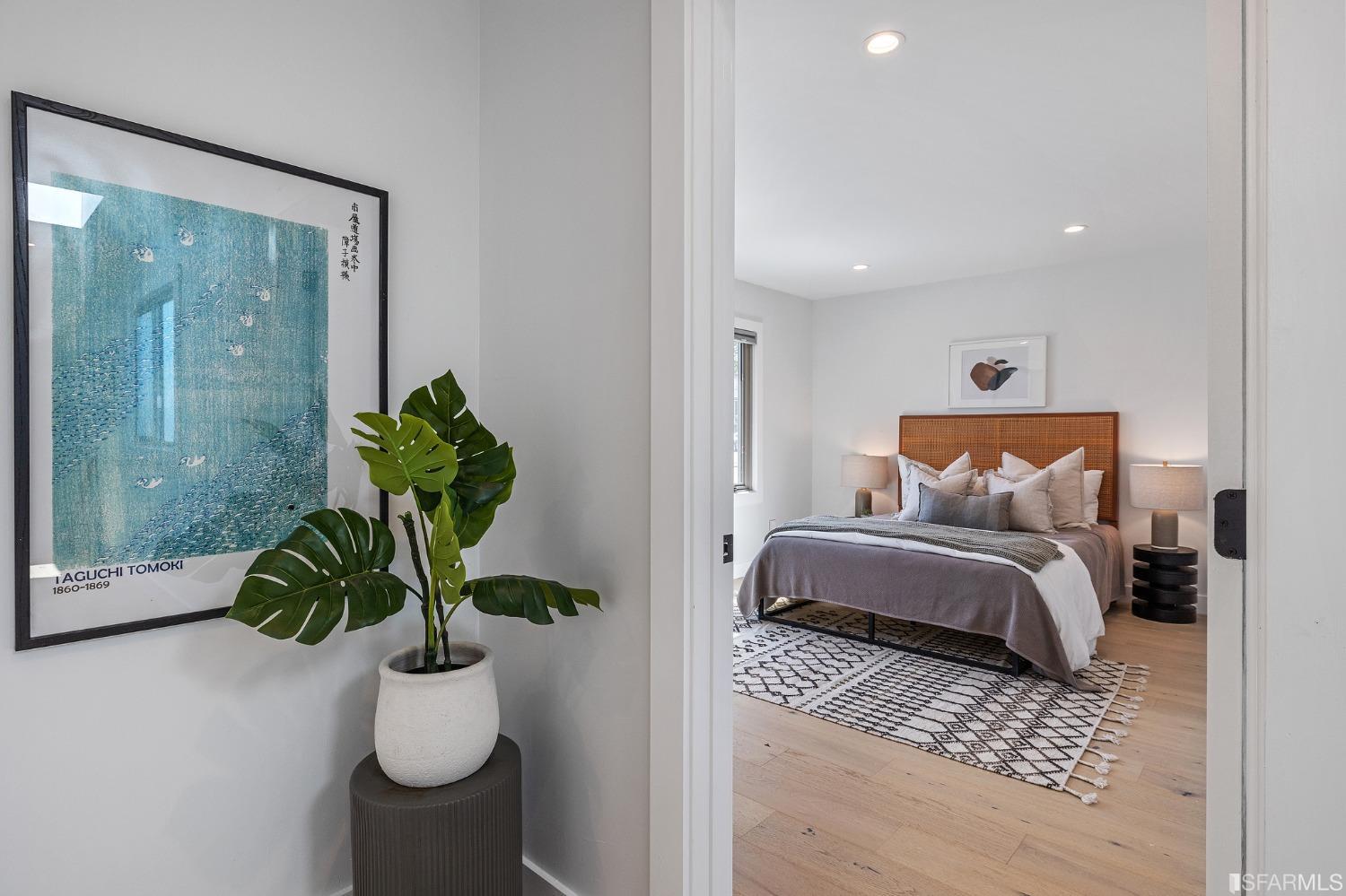 1368 Hillcrest Boulevard Millbrae, CA 94030 - Photo 46 of 65 a picture of a bedroom with a bed and a potted plant