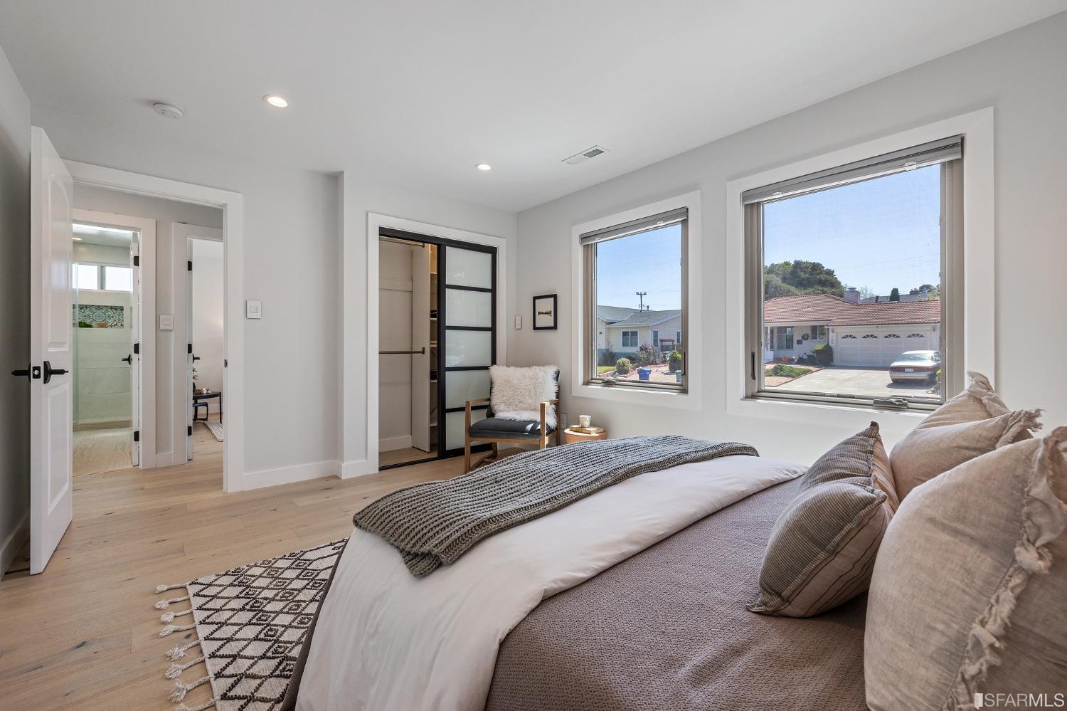 1368 Hillcrest Boulevard Millbrae, CA 94030 - Photo 49 of 65 a bedroom with a bed and a large window