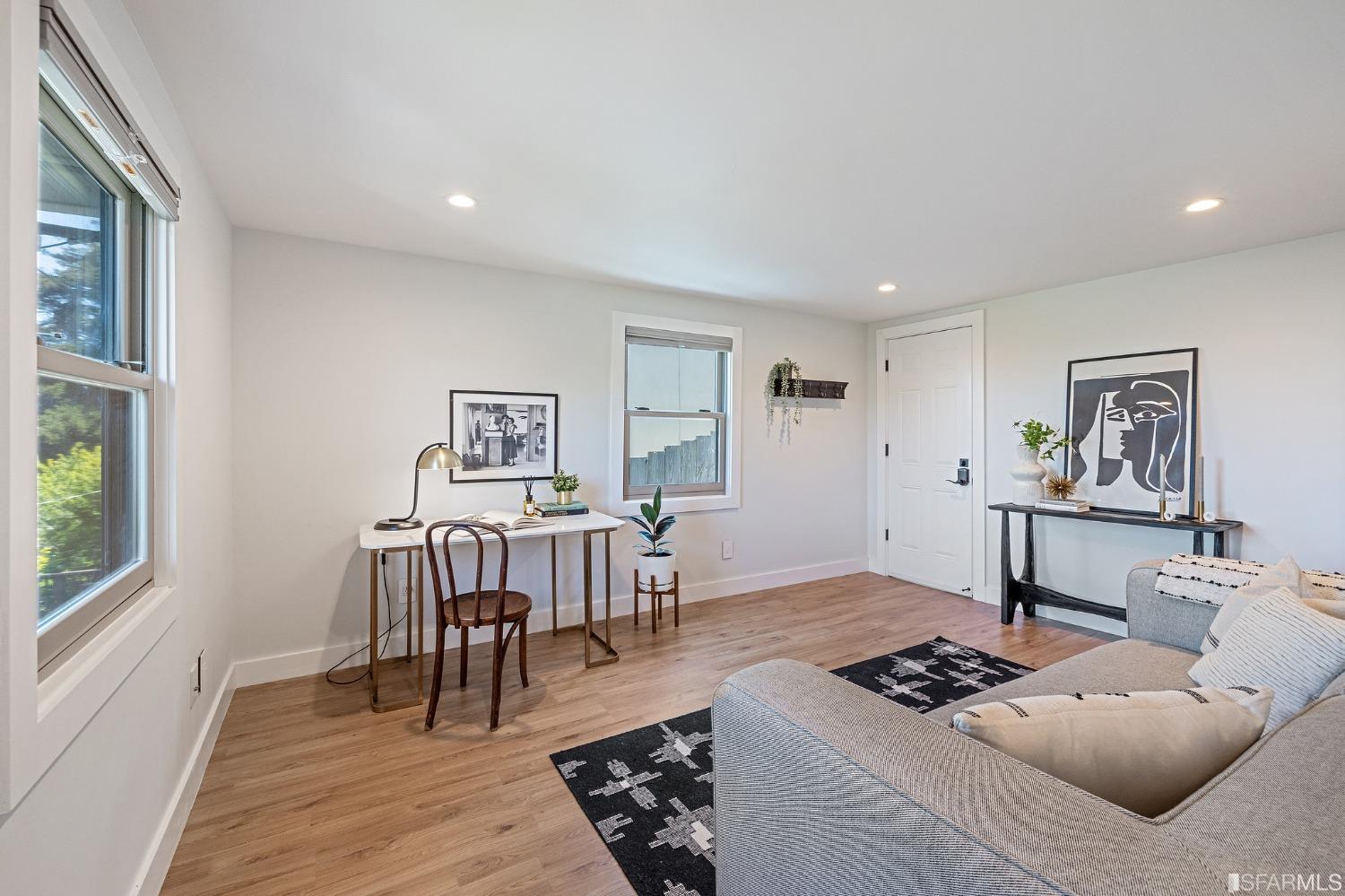 1368 Hillcrest Boulevard Millbrae, CA 94030 - Photo 52 of 65 a living room with furniture a rug and a window