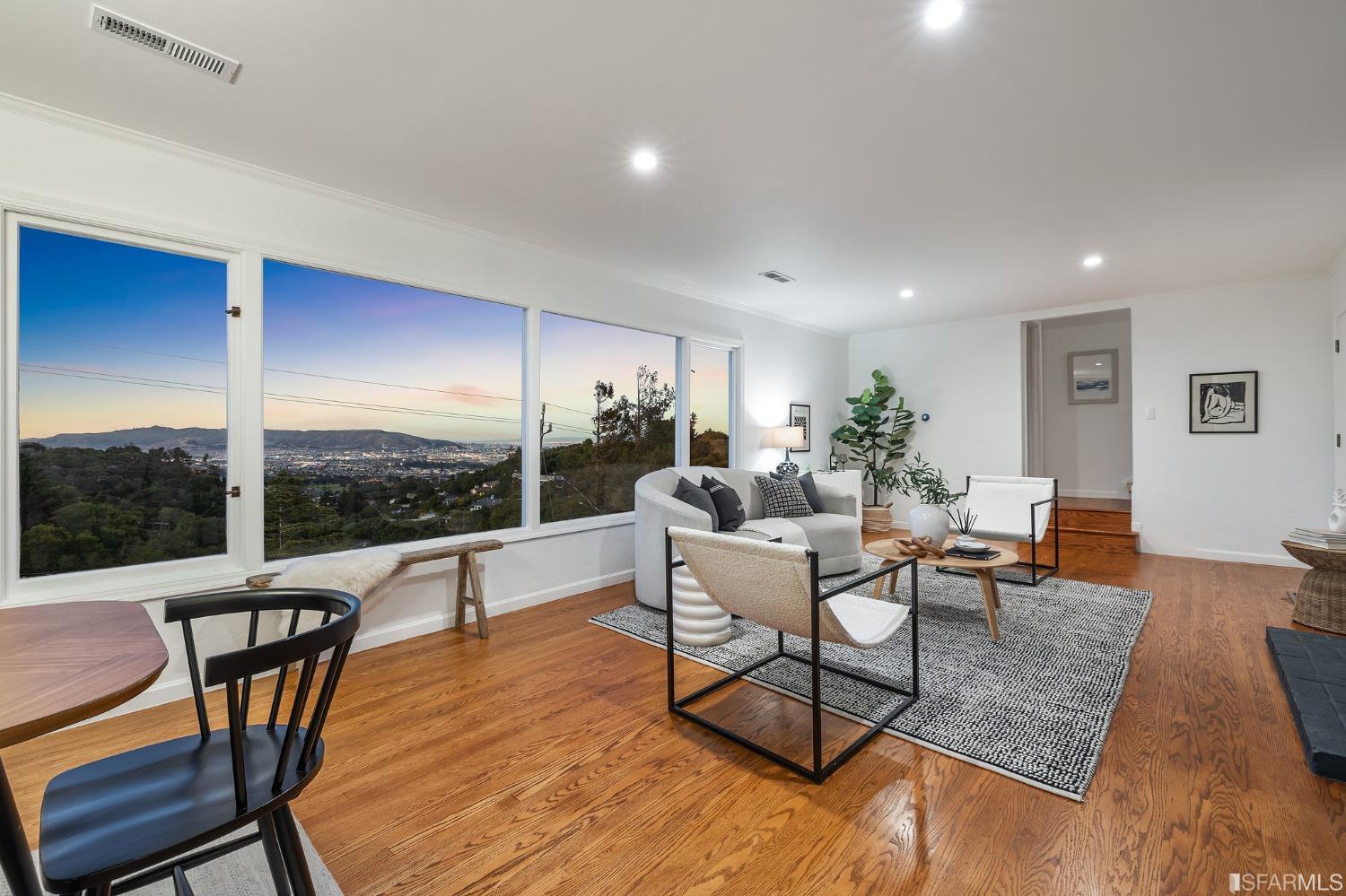 1368 Hillcrest Boulevard Millbrae, CA 94030 - Photo 60 of 65 a living room with furniture a rug and a large window