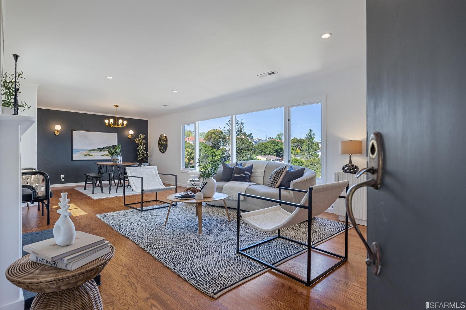 1368 Hillcrest Boulevard Millbrae, CA 94030 - Photo 6 of 65 a living room with furniture and a large window