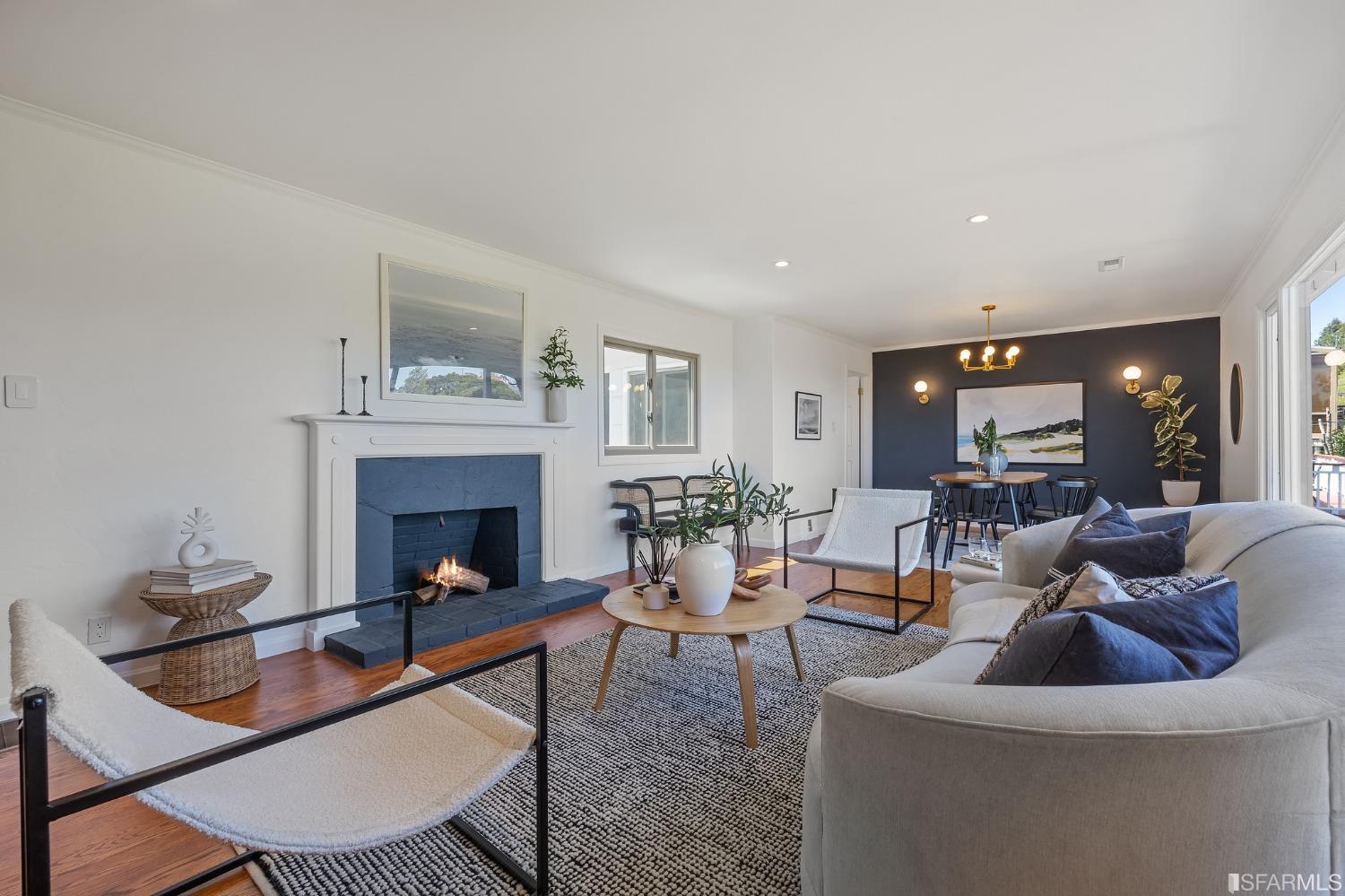 1368 Hillcrest Boulevard Millbrae, CA 94030 - Photo 8 of 65 a living room with furniture and a fireplace