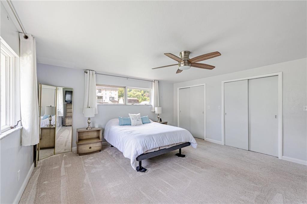 9746 McClellan Street North Huntingdon, PA 15642 - Photo 19 of 30 a living room with a bed furniture and a window