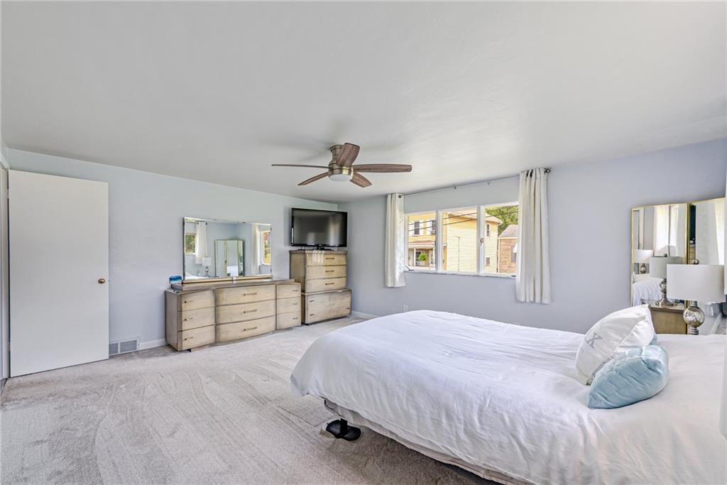 9746 McClellan Street North Huntingdon, PA 15642 - Photo 20 of 30 a bedroom with a large bed and dresser