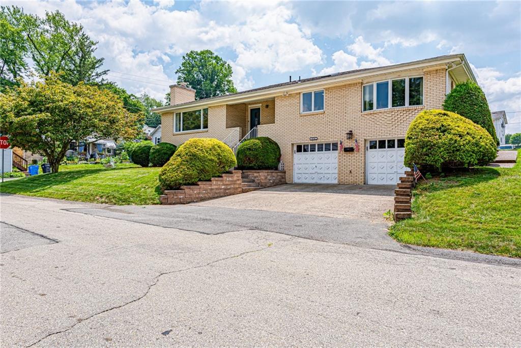 9746 McClellan Street North Huntingdon, PA 15642 - Photo 2 of 30 front view of a house with a yard