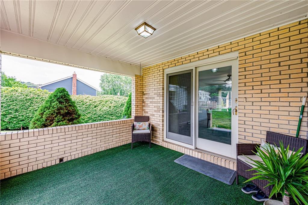 9746 McClellan Street North Huntingdon, PA 15642 - Photo 25 of 30 a view of a porch with a garden