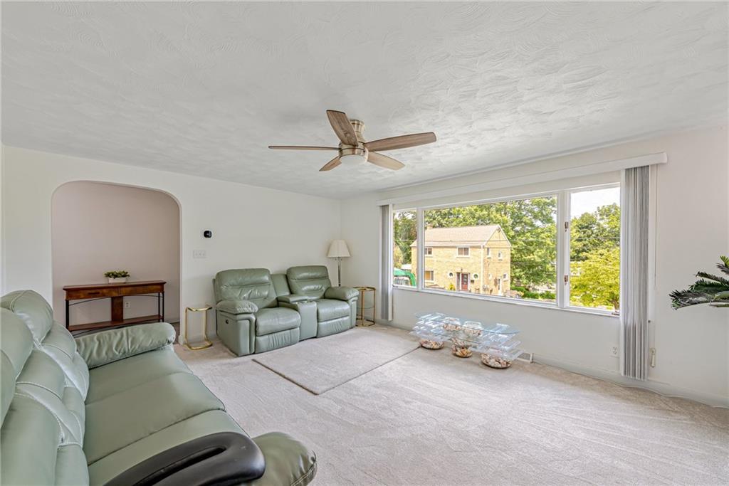 9746 McClellan Street North Huntingdon, PA 15642 - Photo 7 of 30 a living room with furniture and a large window
