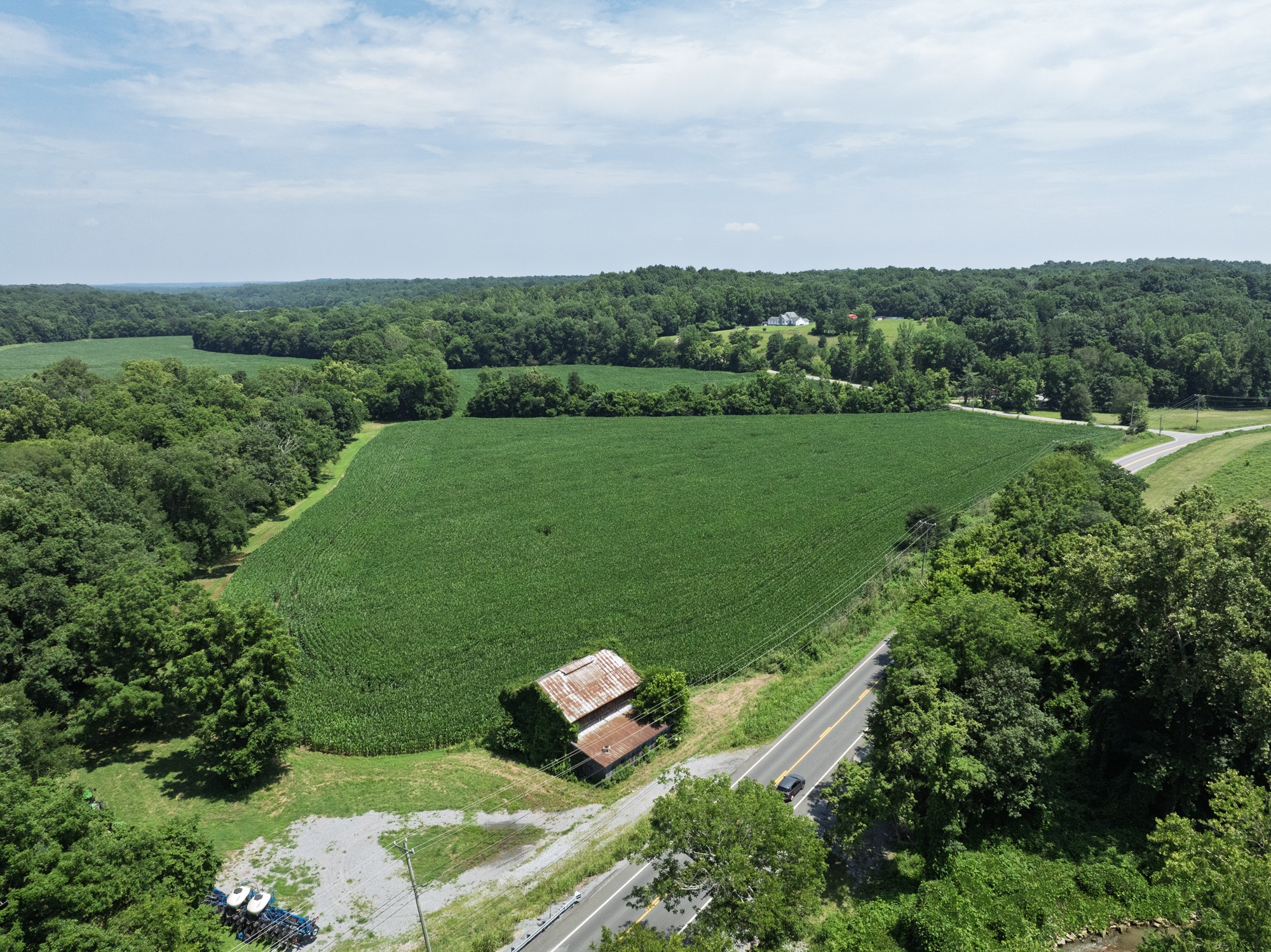 4801 State Highway 48 Cumberland Furnace, TN 37051 - Photo 19 of 46 an aerial view of a golf course with huge green field and trees