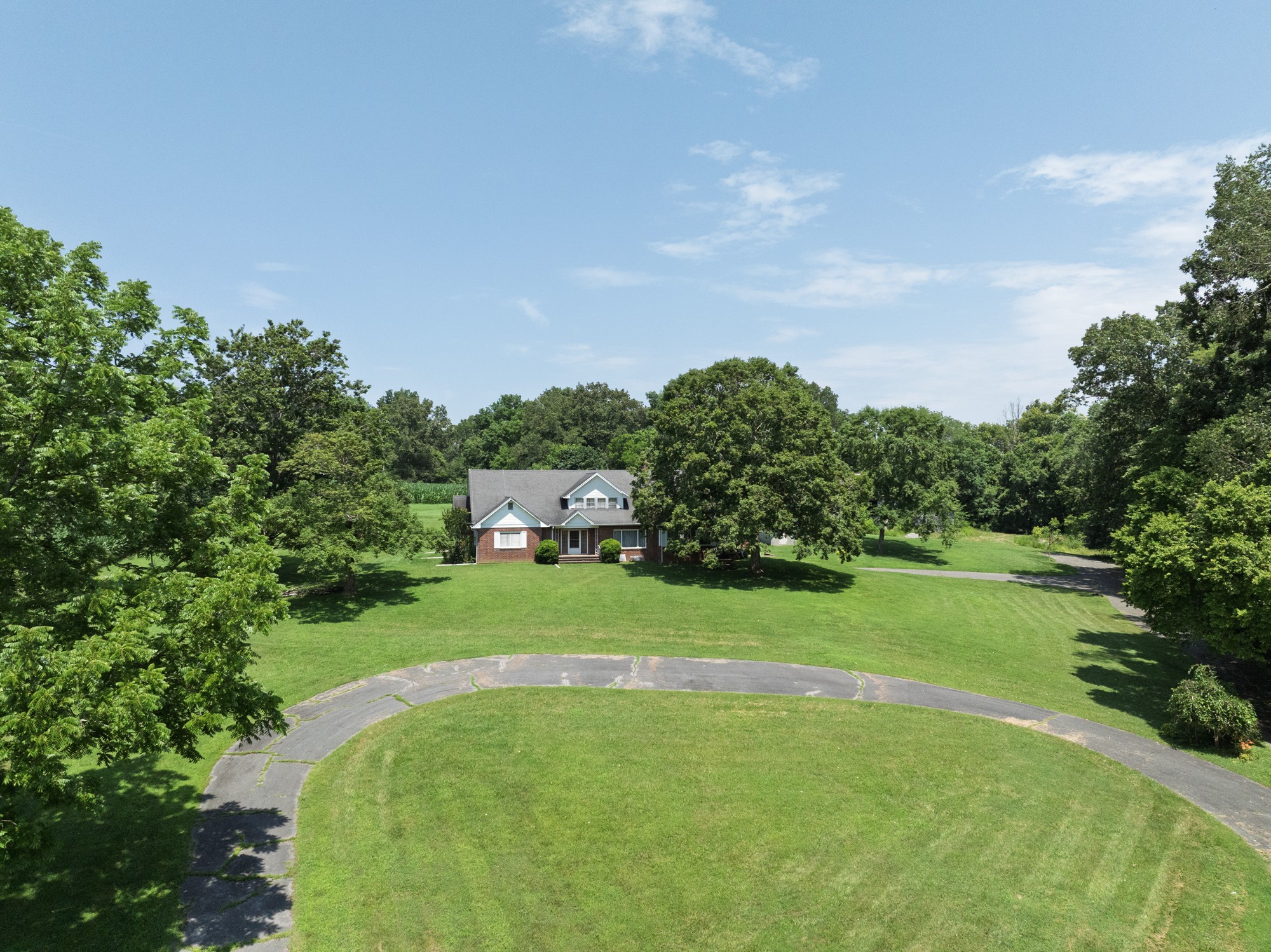 4801 State Highway 48 Cumberland Furnace, TN 37051 - Photo 45 of 46 a view of a house with a big yard and potted plants