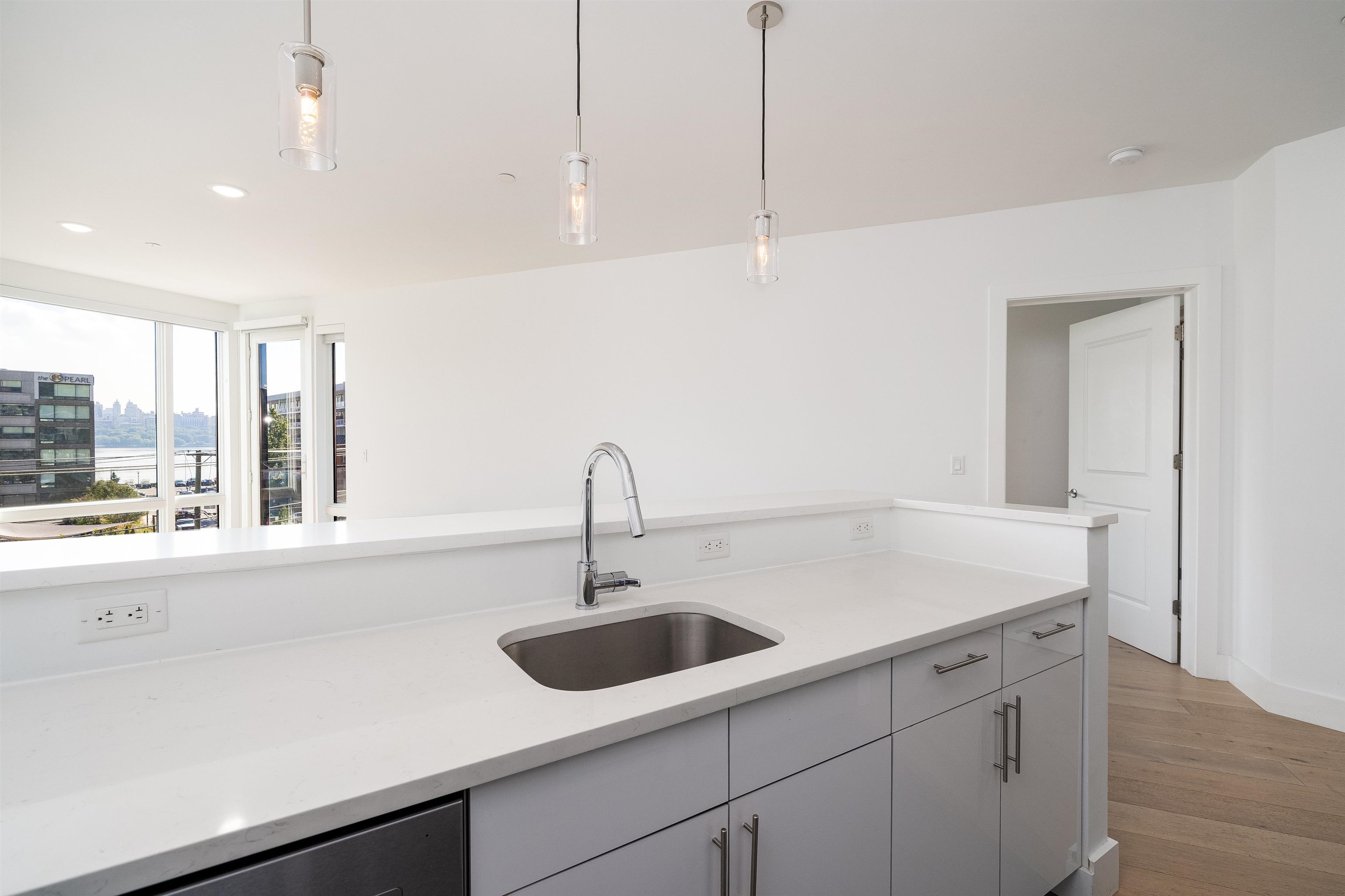 8621 River Road, Unit 6A North Bergen, NJ 07047 - Photo 13 of 42 a kitchen with a sink and window