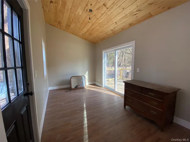 a room with furniture and a window