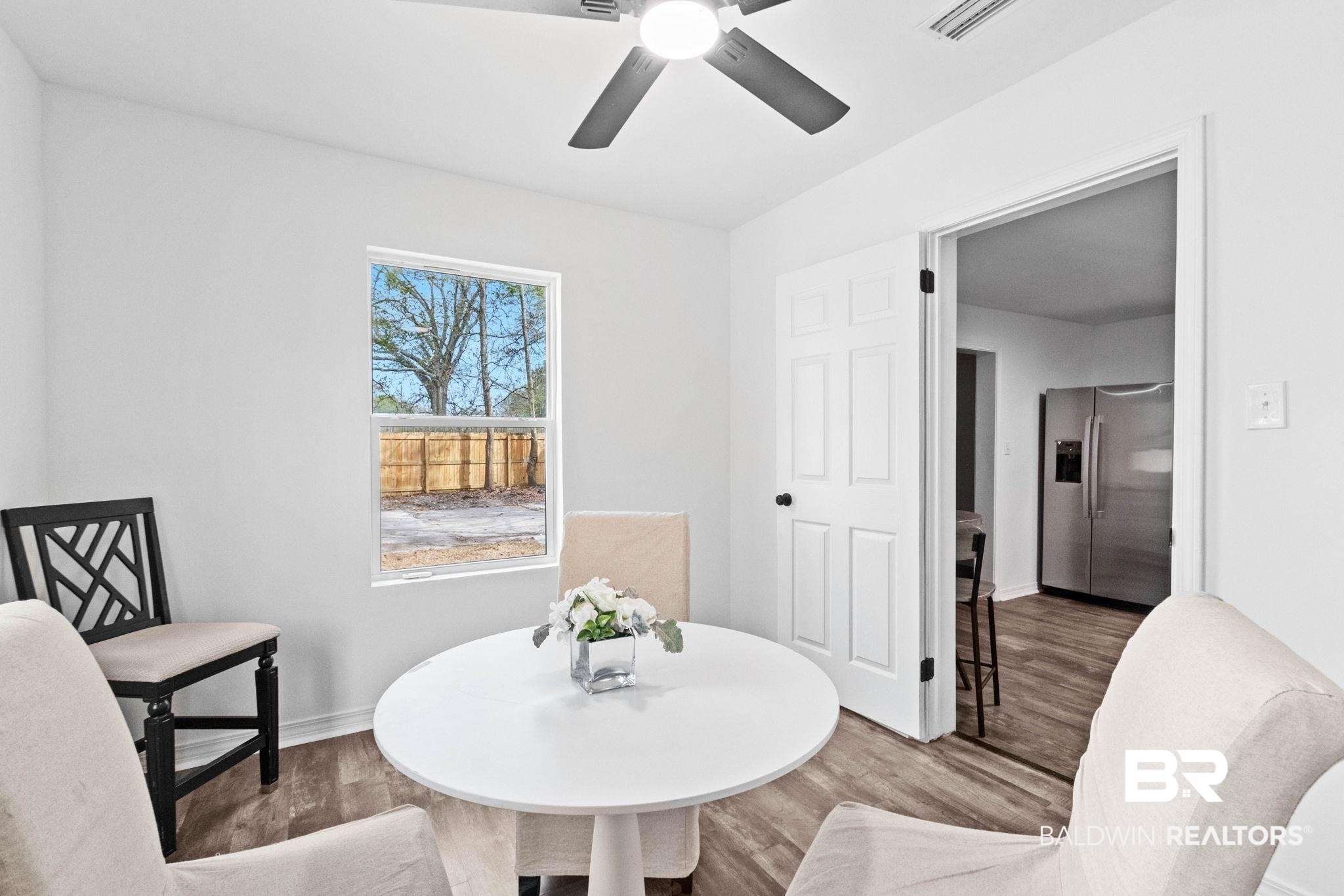 128 Bush Avenue Mobile, AL 36604 - Photo 17 of 40 Sitting room featuring wood finished floors and a ceiling fan