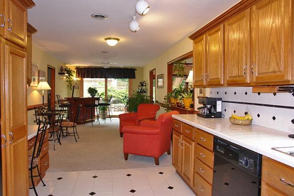 215 W Road Blue Ridge, VA 24064 - Photo 11 of 47 a kitchen with sink refrigerator and large window