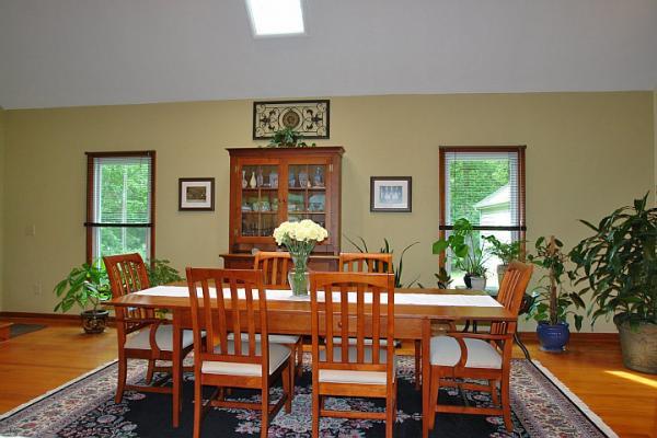 215 W Road Blue Ridge, VA 24064 - Photo 17 of 47 a view of a dining room with furniture and window