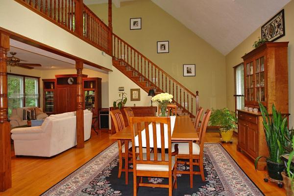 215 W Road Blue Ridge, VA 24064 - Photo 20 of 47 a view of an chairs and dining room with wooden floor