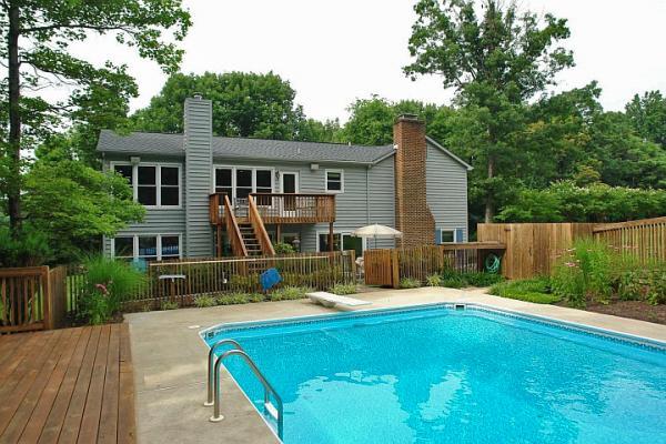 215 W Road Blue Ridge, VA 24064 - Photo 35 of 47 a view of a house with backyard and sitting area