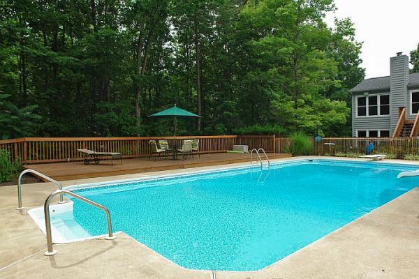 215 W Road Blue Ridge, VA 24064 - Photo 36 of 47 a view of a swimming pool with a patio