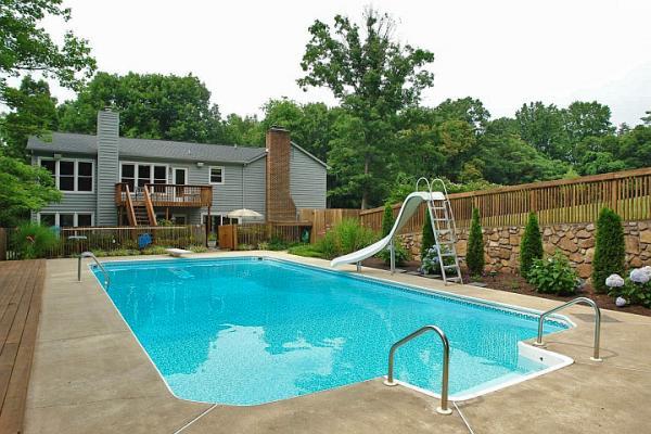 215 W Road Blue Ridge, VA 24064 - Photo 39 of 47 a view of a house with pool backyard and chairs