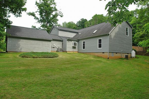 215 W Road Blue Ridge, VA 24064 - Photo 40 of 47 a house view with a garden space