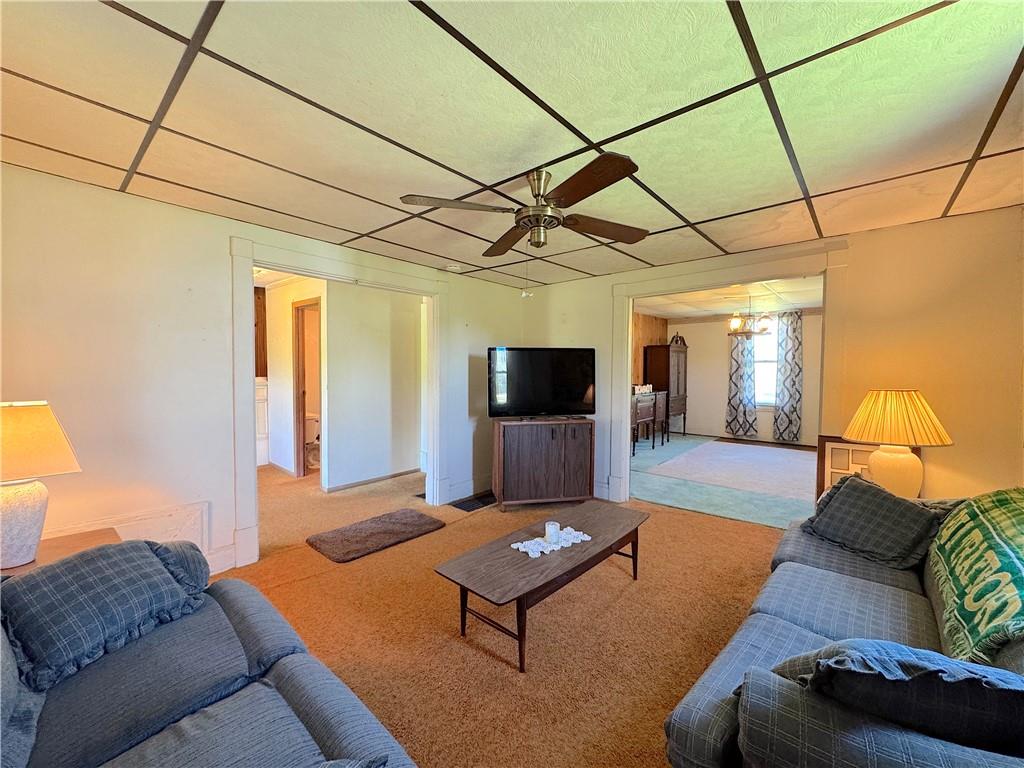 3003 Riverside Drive Claridge, PA 15623 - Photo 13 of 28 a living room with furniture and a flat screen tv