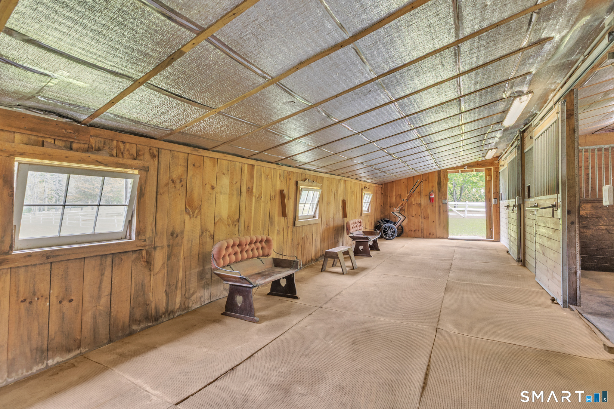 808 Branch Road Suffield, CT 06078 - Photo 33 of 40 a room with furniture and a large window