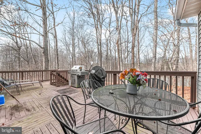 a view of a chairs and tables in the patio