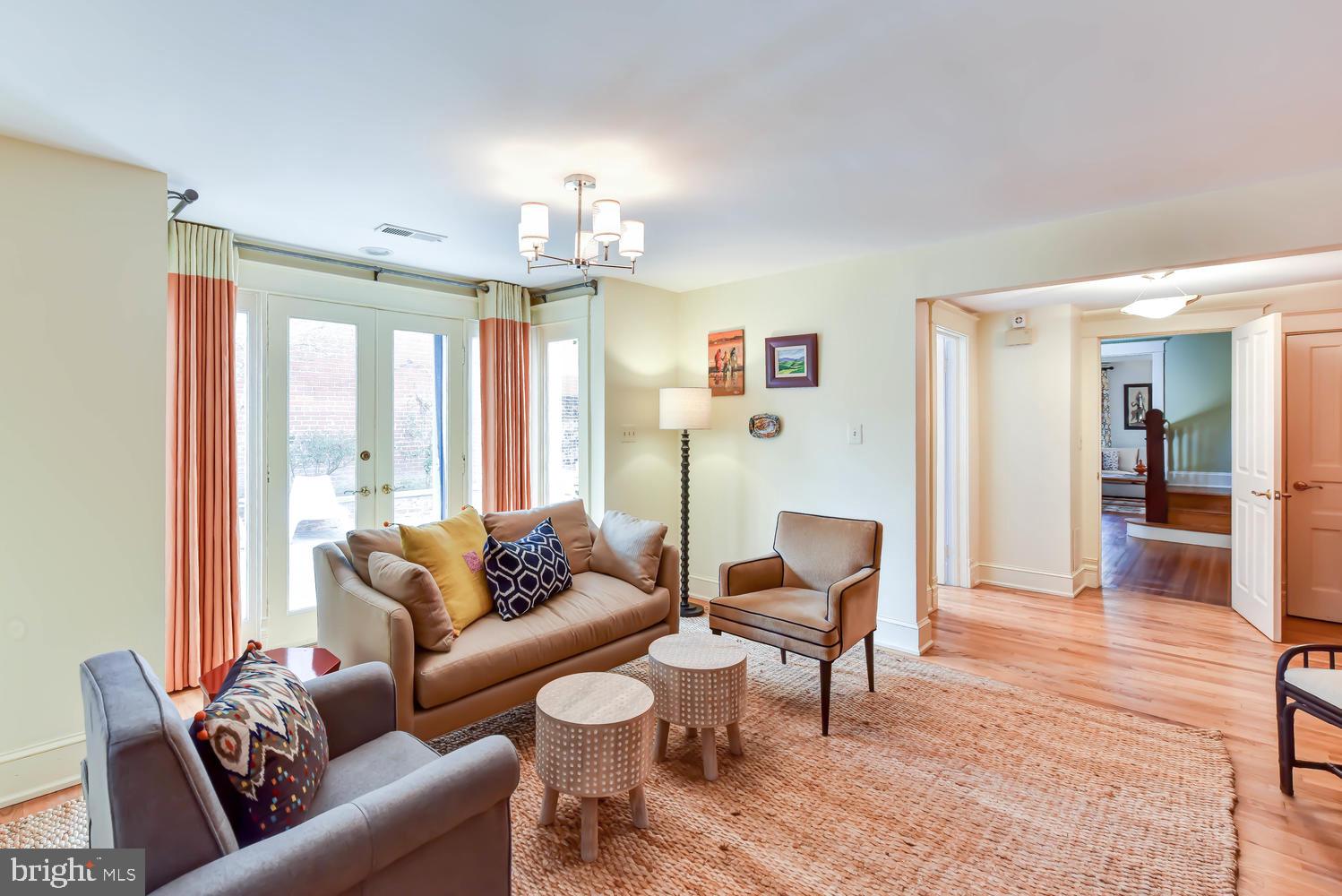 645 E Street Southeast Washington, DC 20003 - Photo 14 of 57 a living room with furniture and wooden floor